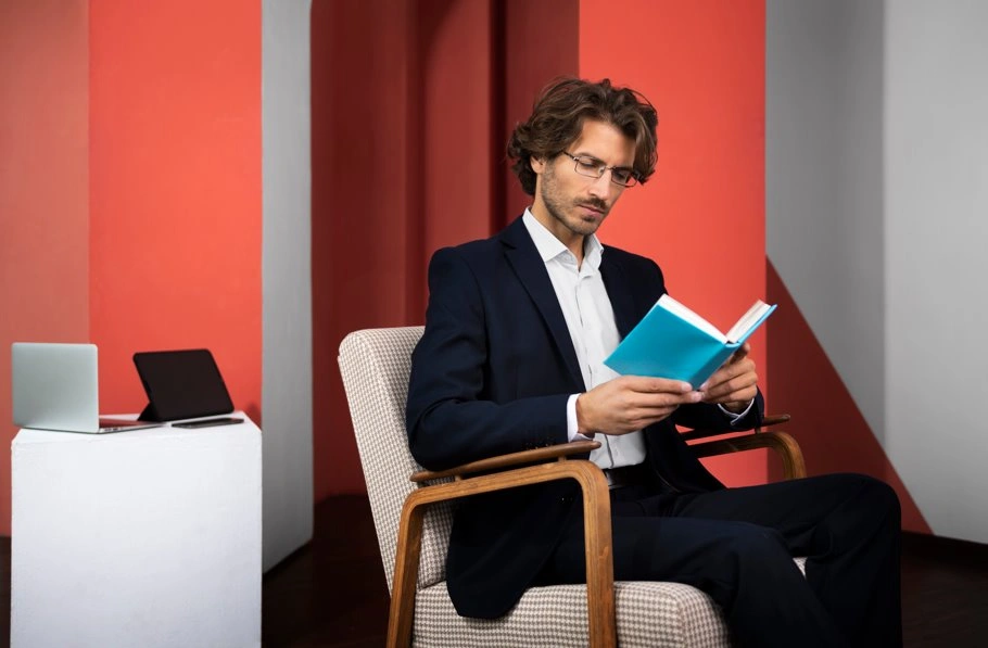 Professional exploring leadership and management books