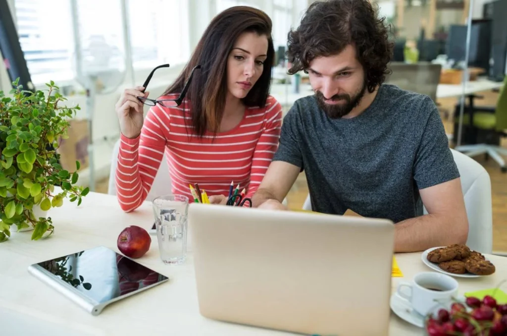 couple working together on laptop